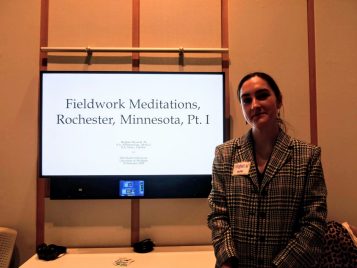 Meghan Wysocki standing by her project, "Fieldwork Meditations Rochester, Minnesota, Pt. I."